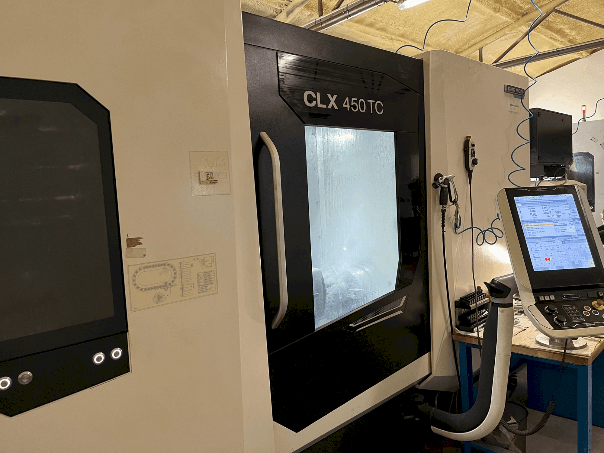 Front view of DMG MORI CLX 450 TC machine