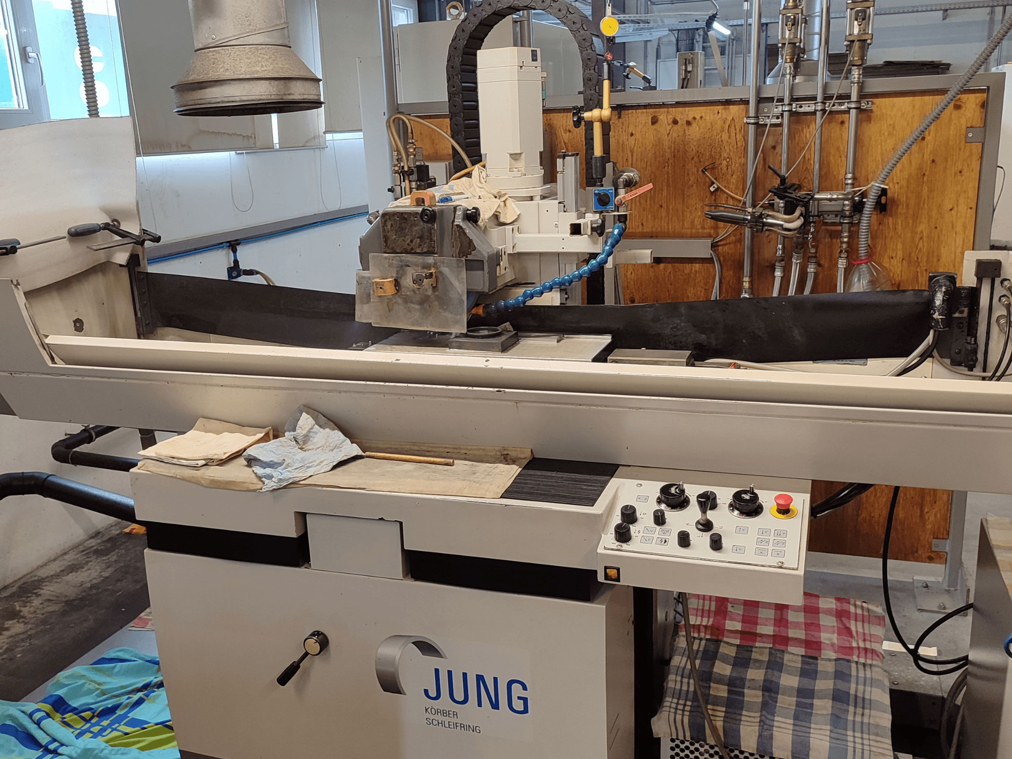 BLOHM JUNG JE 525 P surface grinding machine, front view, featuring controls and grinding wheel setup.