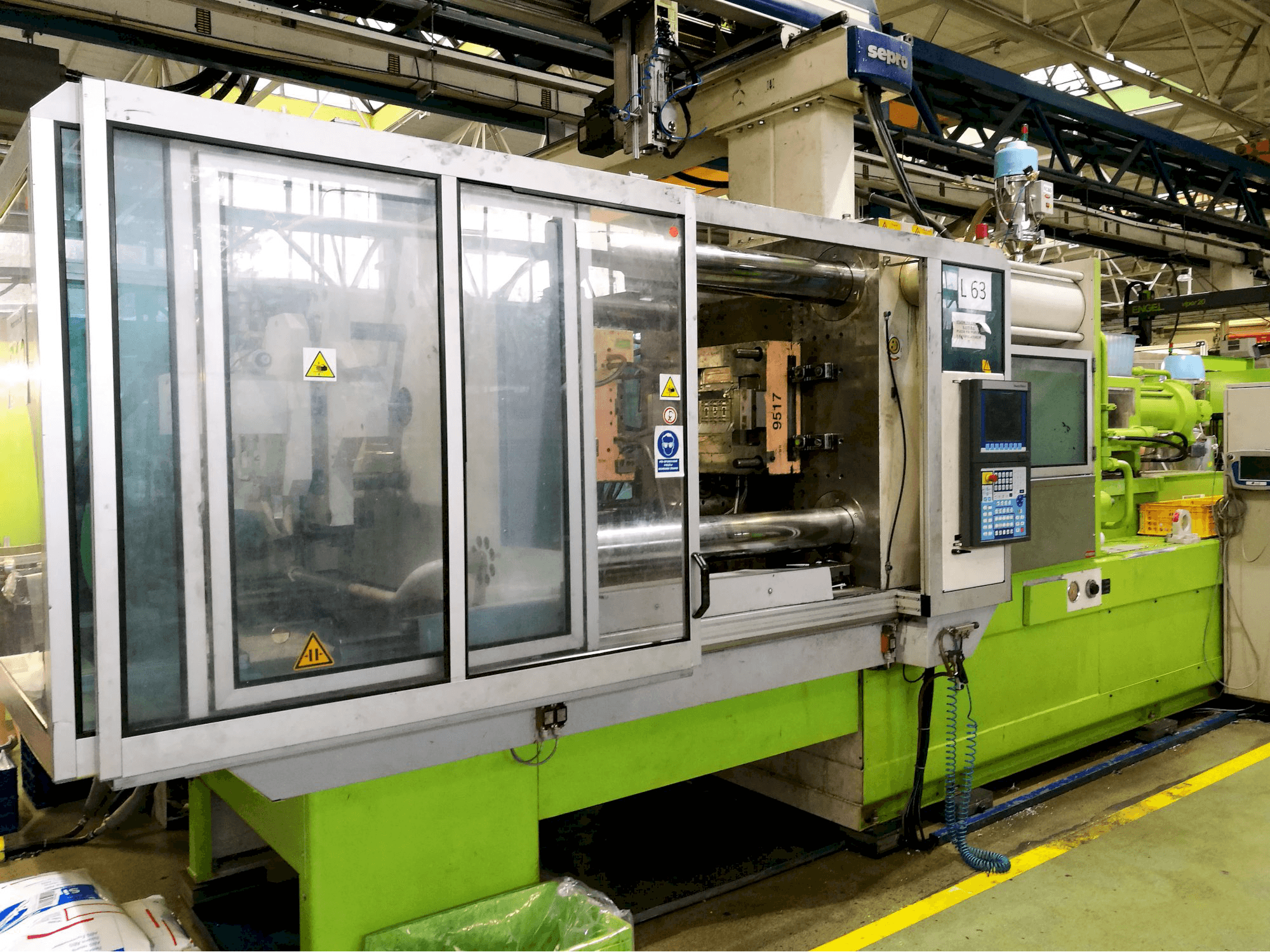 Left view of Krauss Maffei 420-1900 C2 Machine