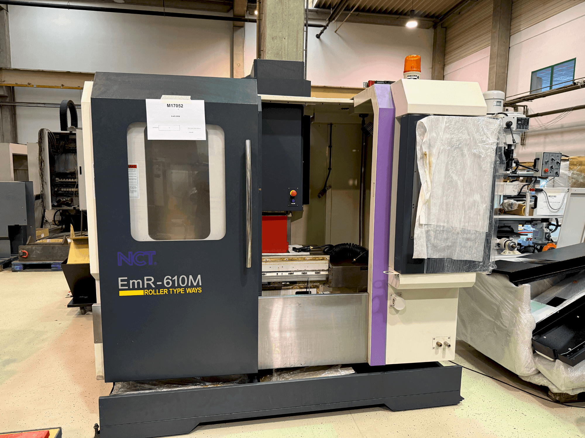 Front view of NCT EmR-610M machine