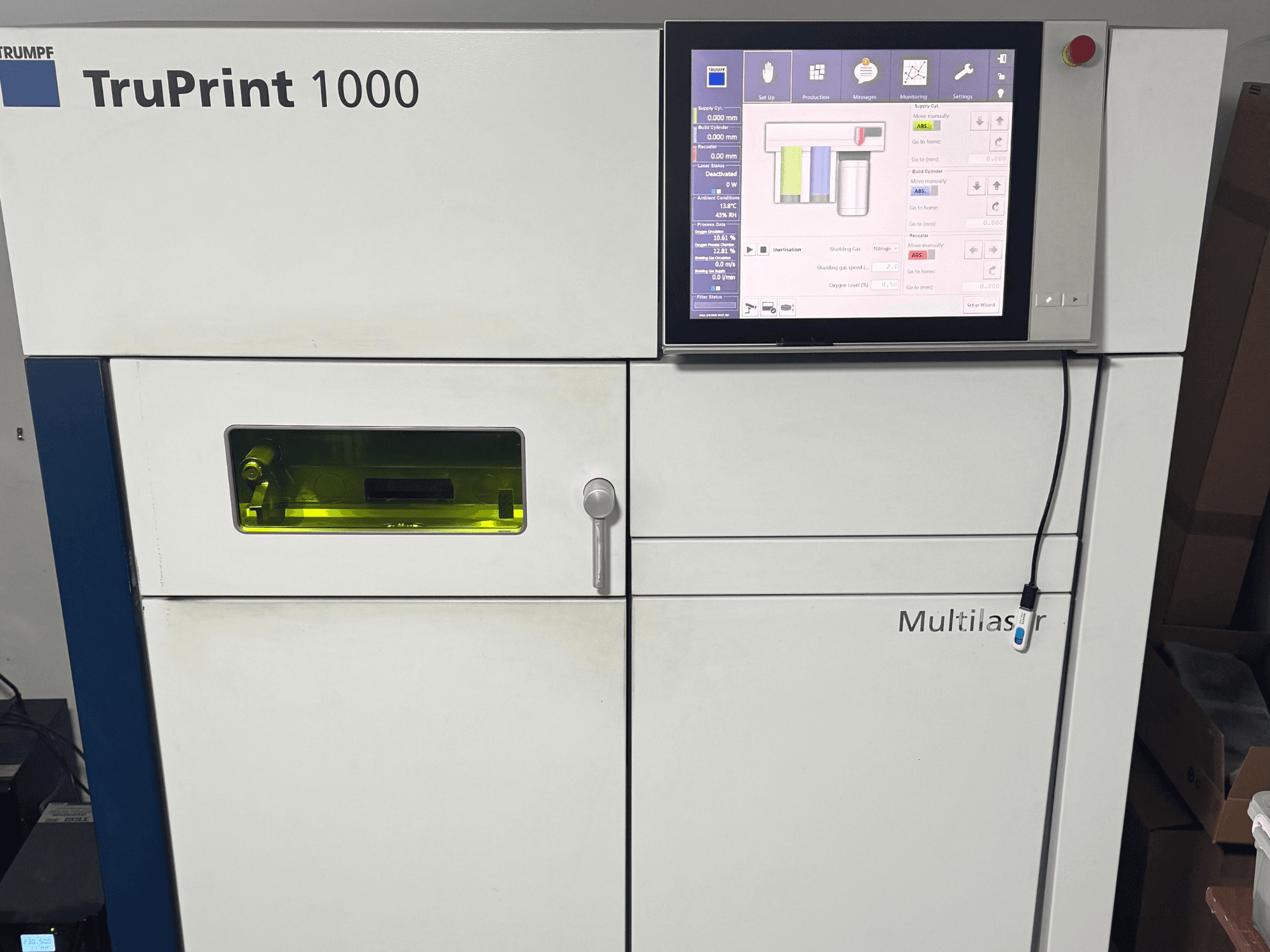 TruPrint 1000 by Trumpf, front view, featuring a digital control panel and a transparent inspection window for monitoring.