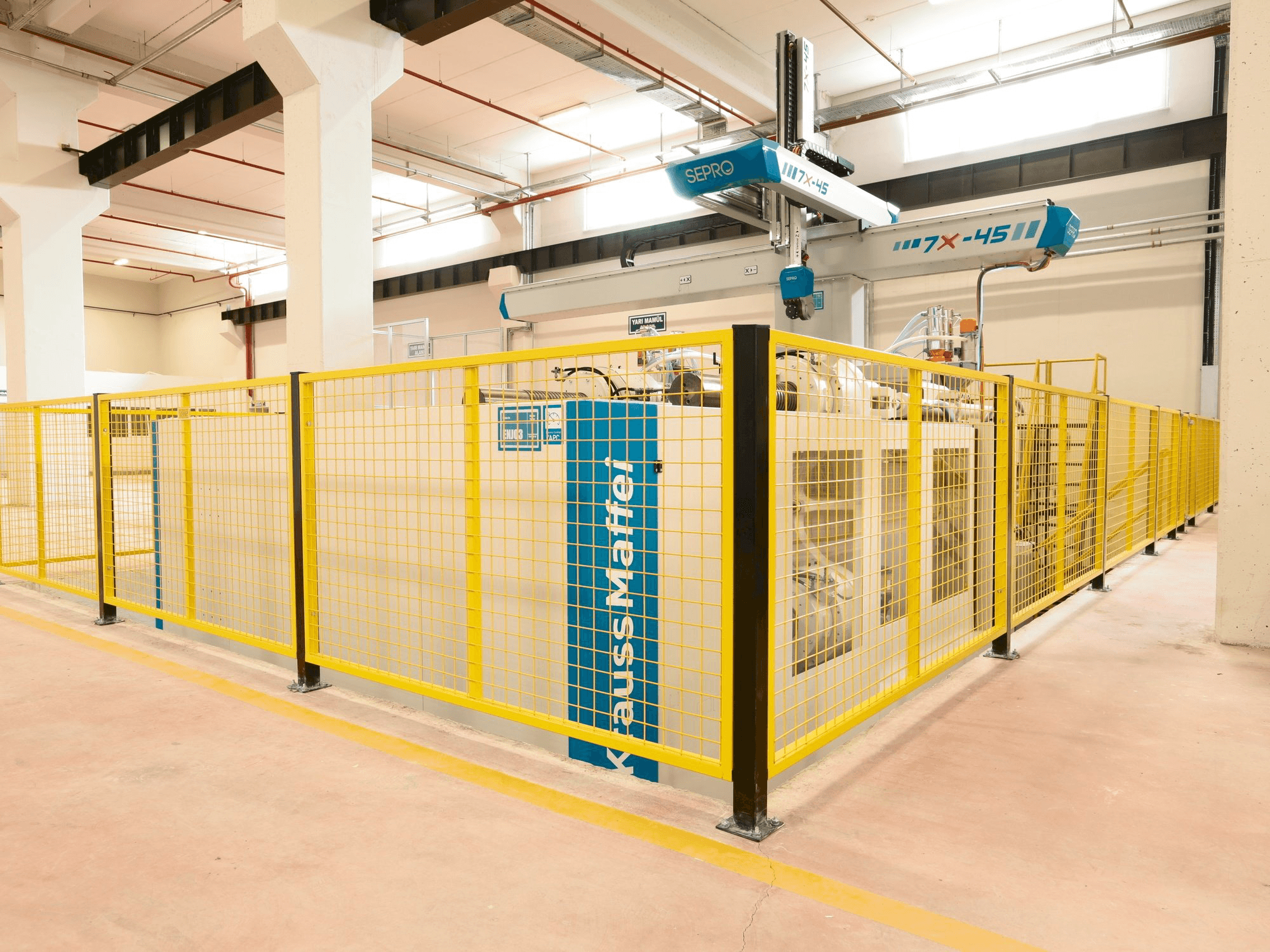 Front view of Krauss Maffei 1300/8100 MX machine