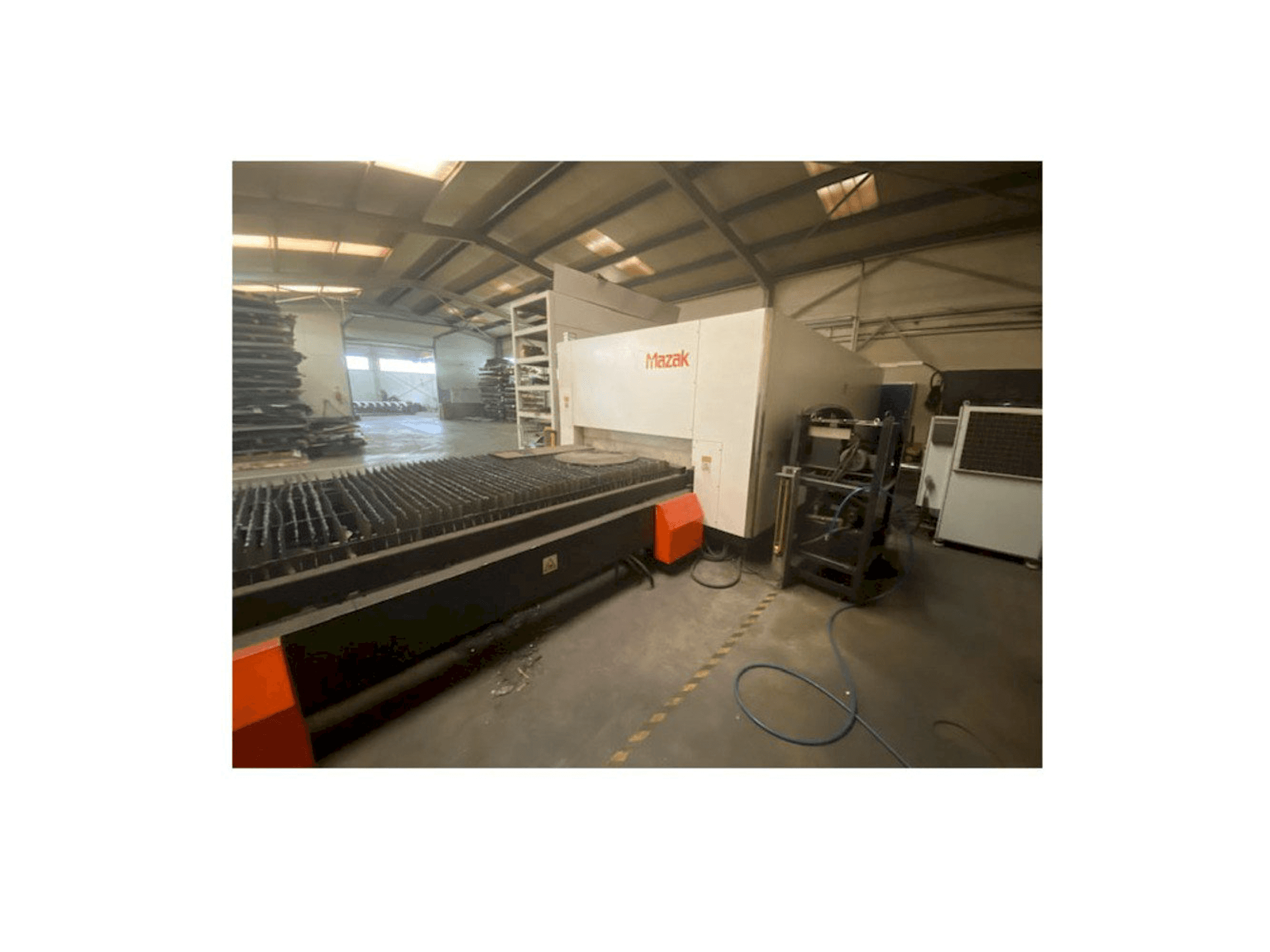 Front view of Mazak Optiplex Nexus 3015 machine