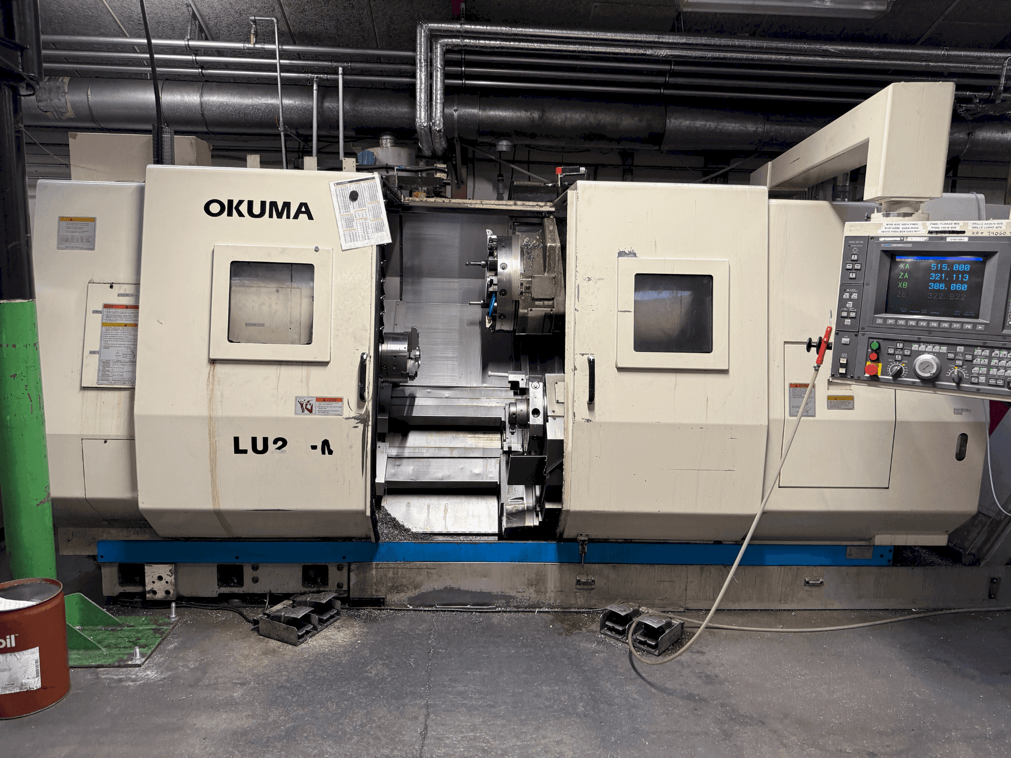 Front view of Okuma LU2-M machine