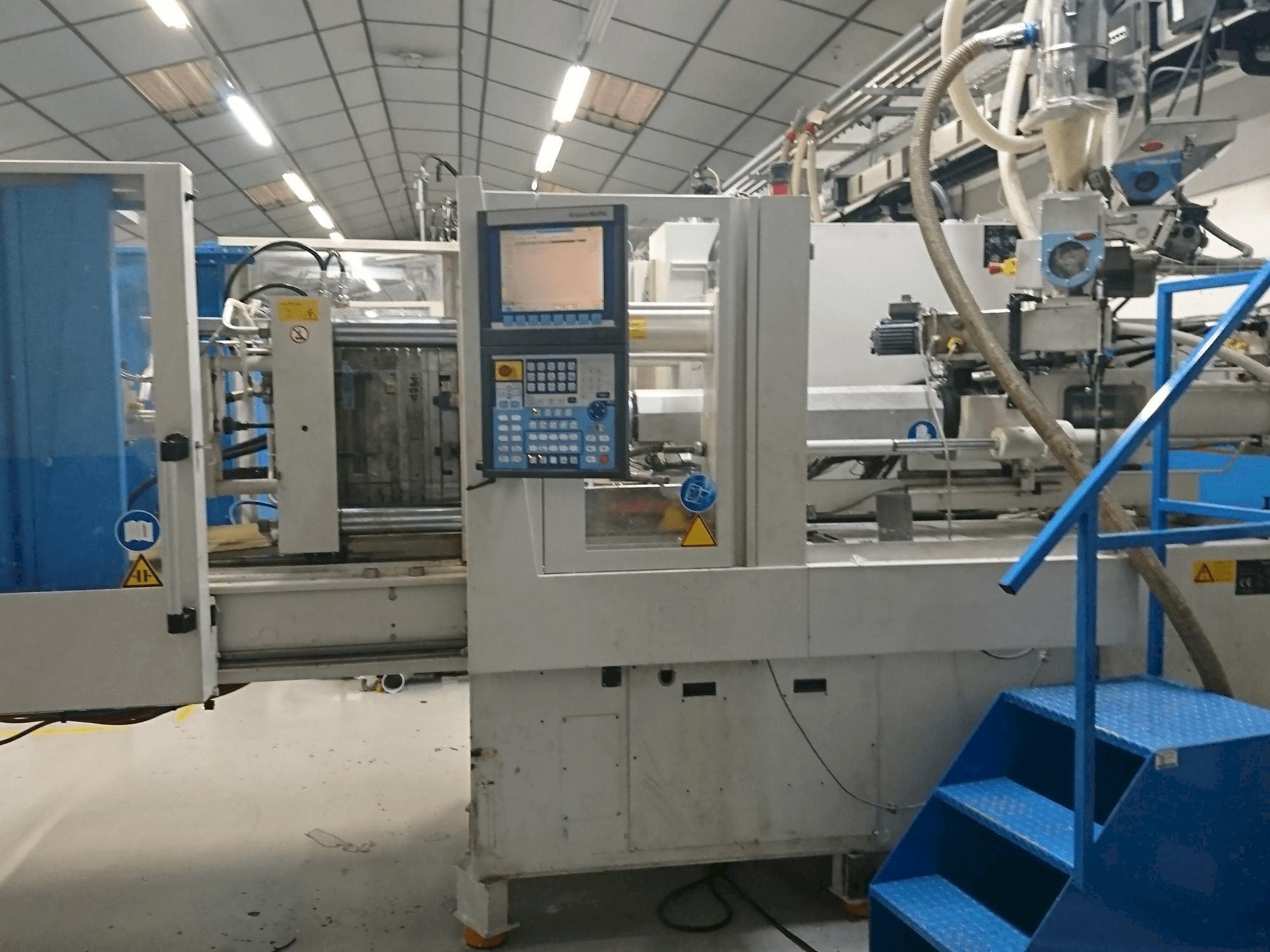 Front view of Krauss Maffei 80-750 CX machine