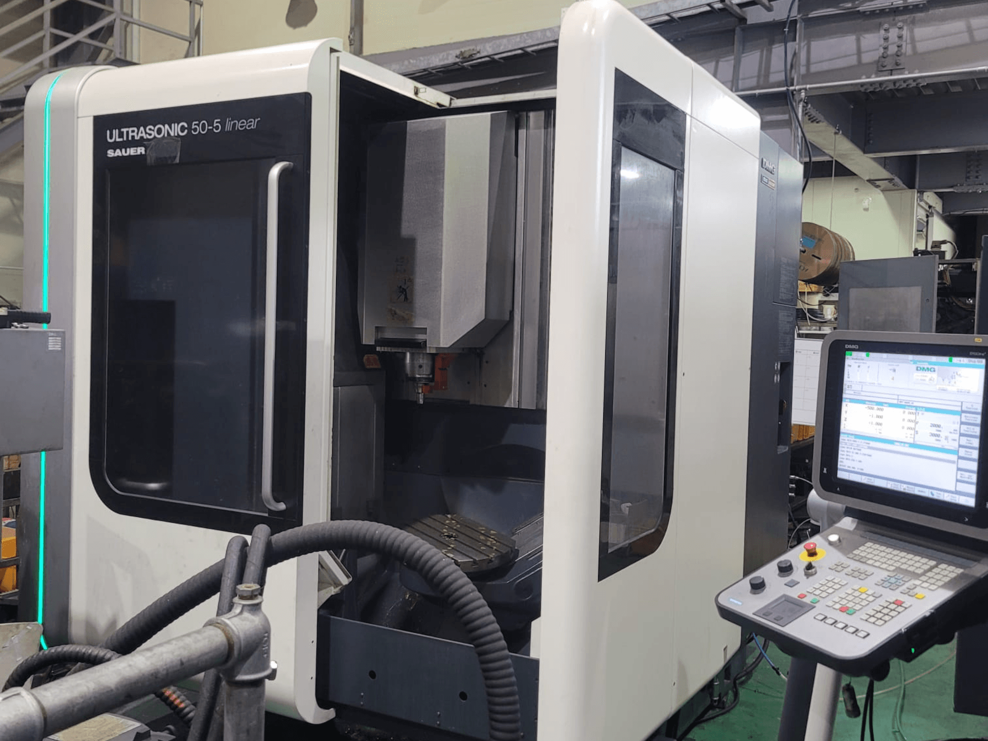 DMG ULTRASONIC 50-5 Linear Universal Machining Centre, front view with control panel and visible work area.