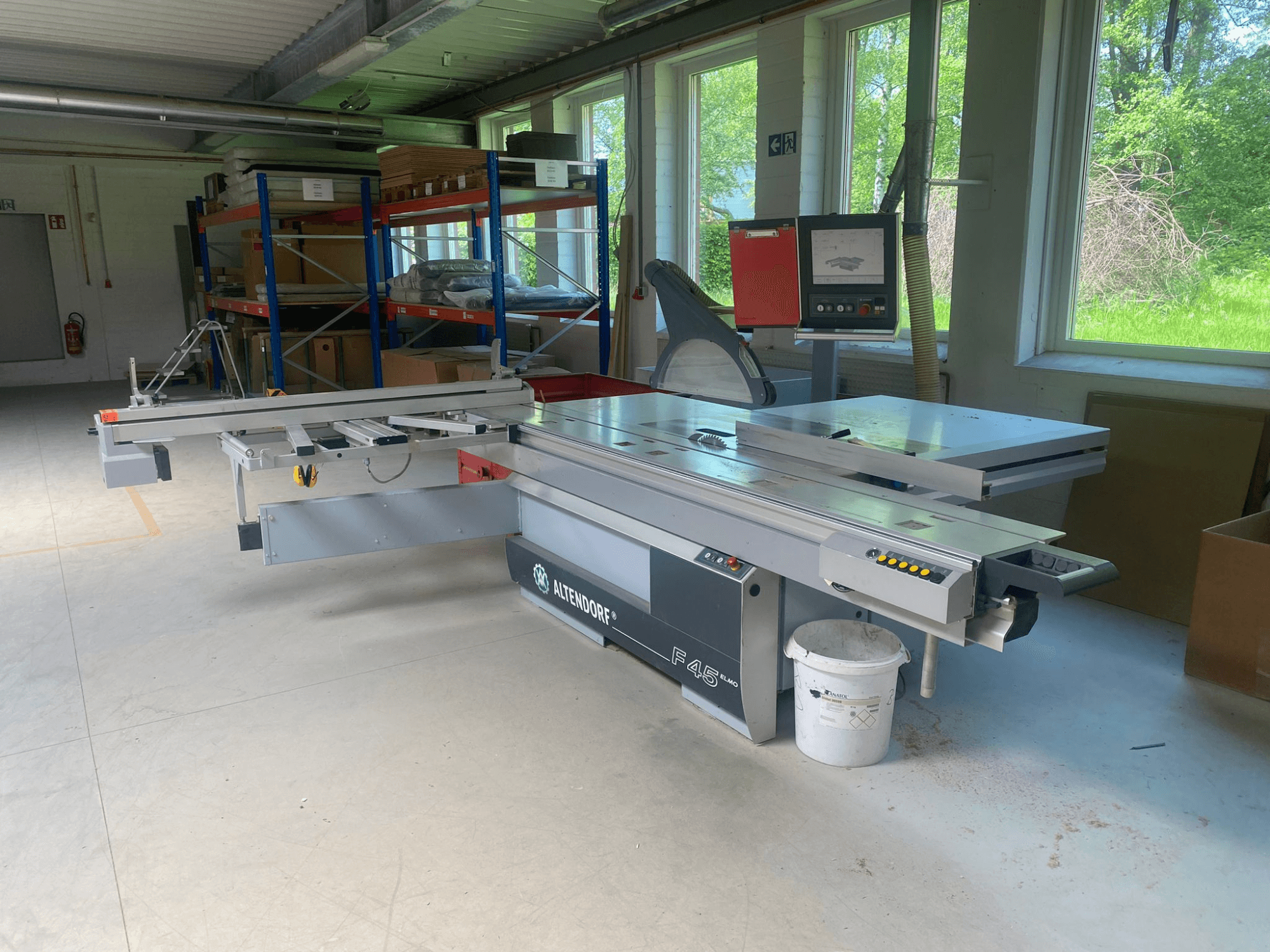 ALTENDORF F45 sliding table saw, front view, with adjustable sliding table, digital display, and control panel visible.