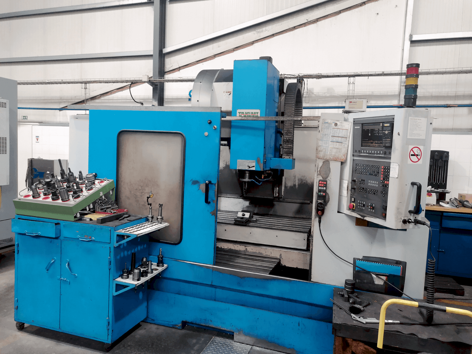 Front view of Takumi V11 machine