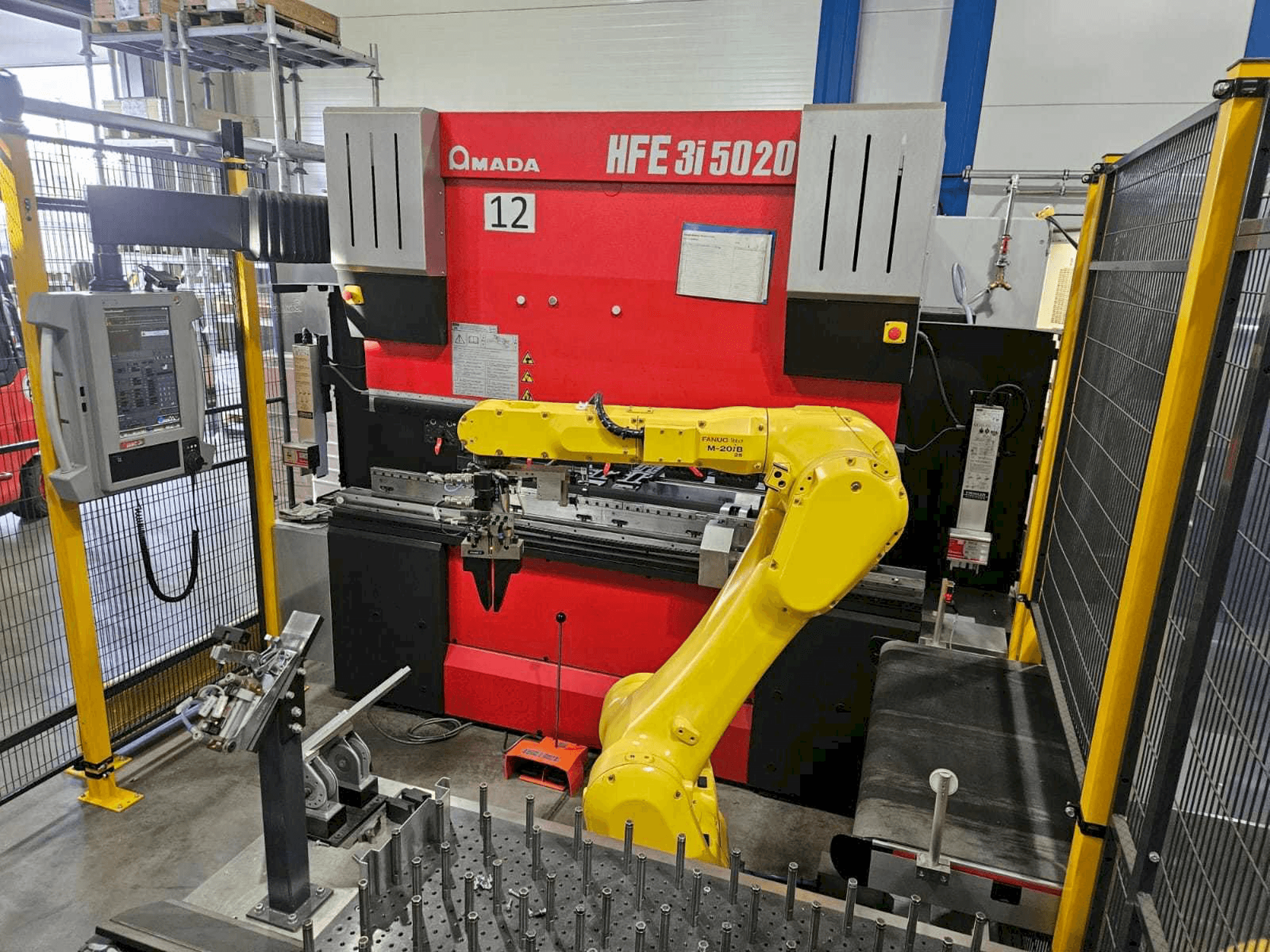 Front view of AMADA HFE5020 3i + Robot machine
