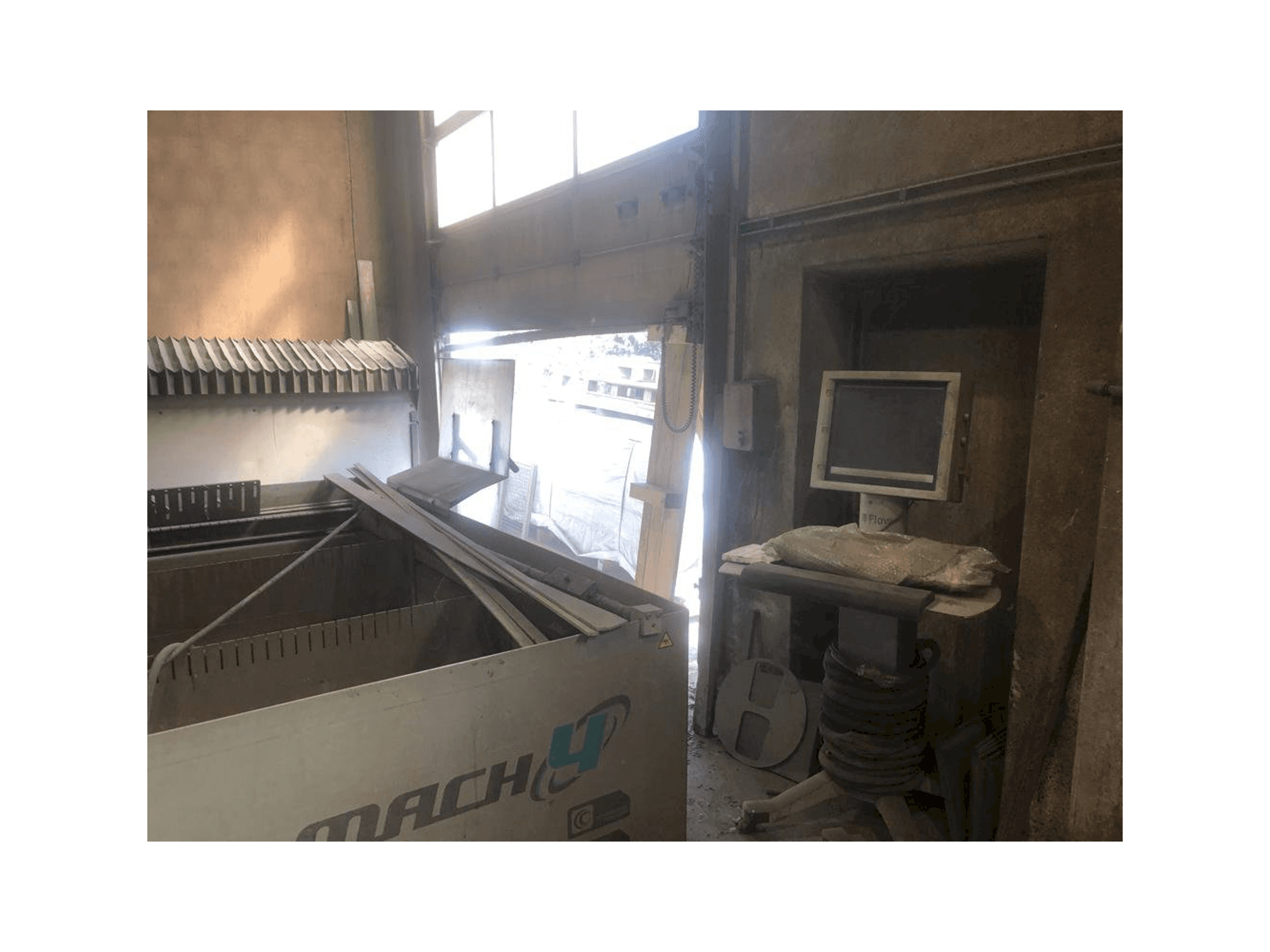 Left side view of Flow Mach 4 3D machine