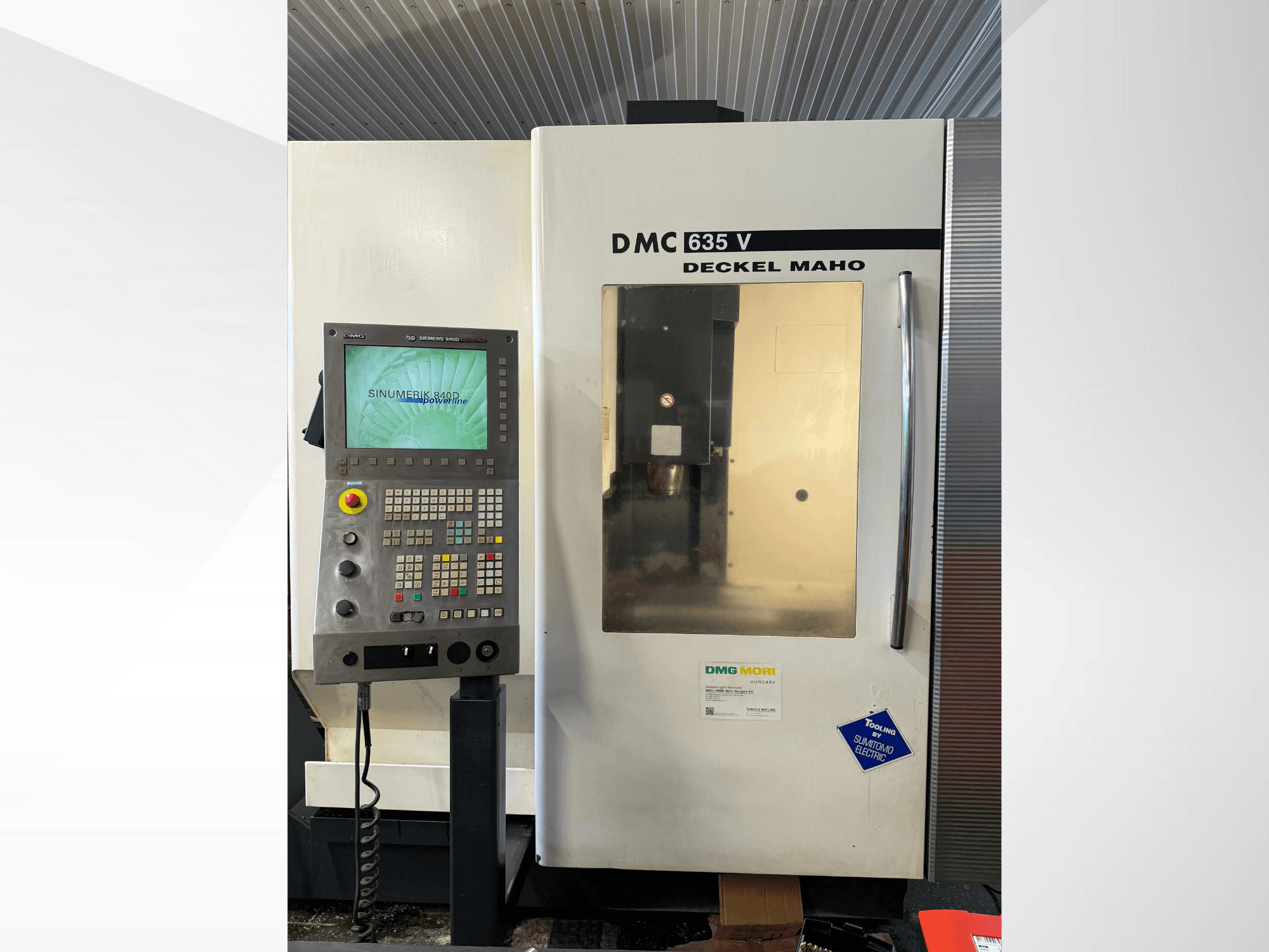 DMG Mori DMC 635 V milling machine with control panel, front view, features Sinumerik display and various operation buttons.
