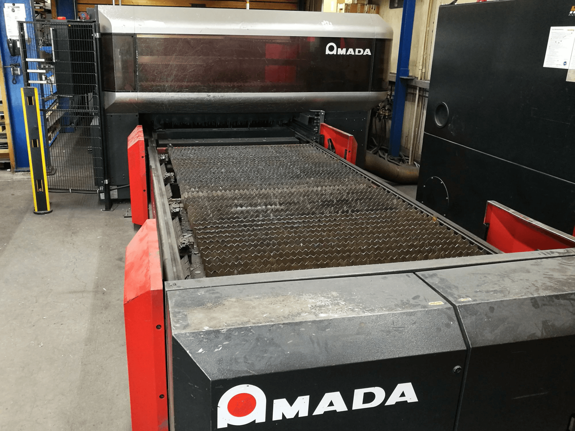 Front view of AMADA LC 3015 X1 NT Machine