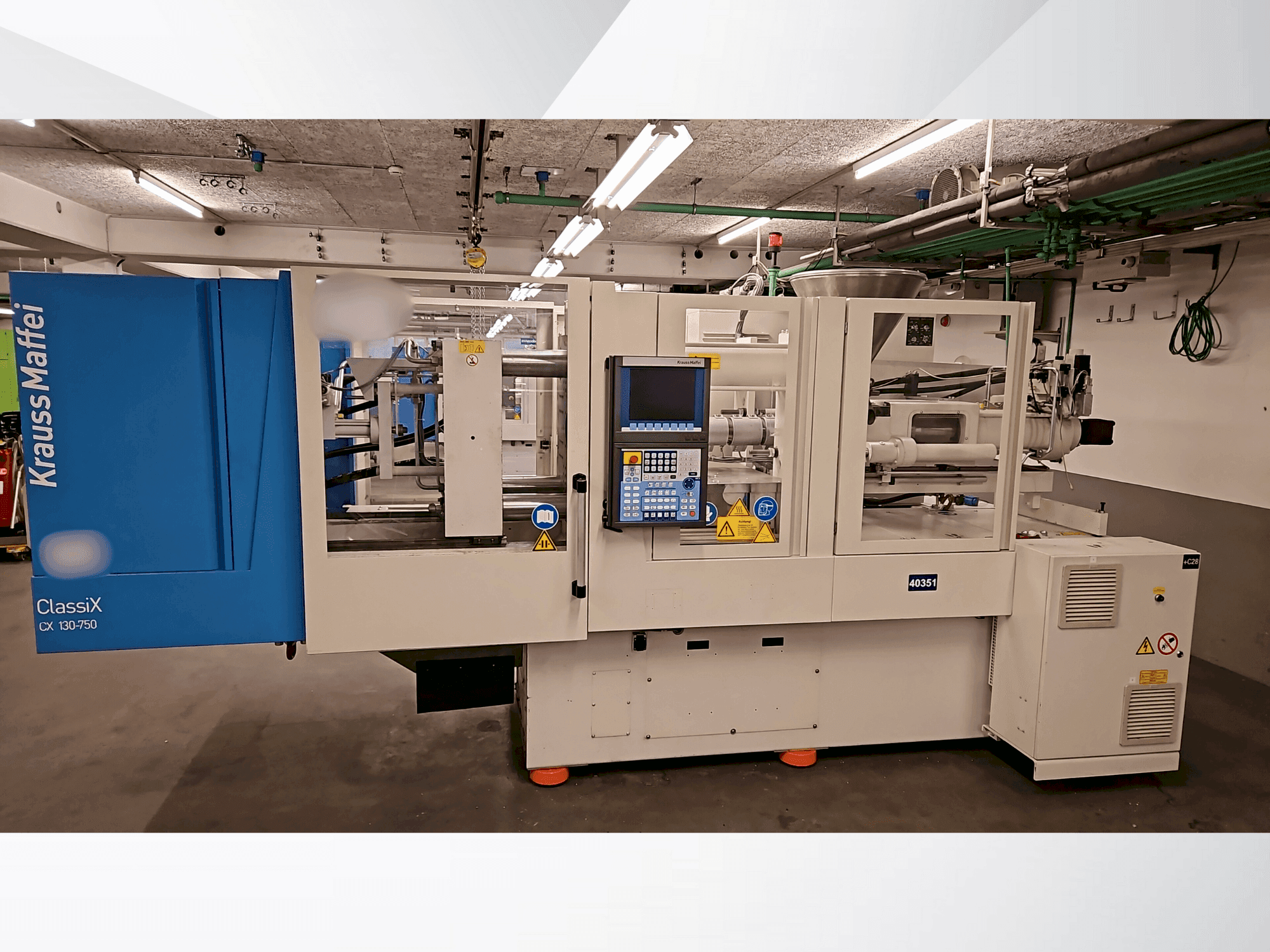 Front view of Krauss Maffei 130-750 CX machine