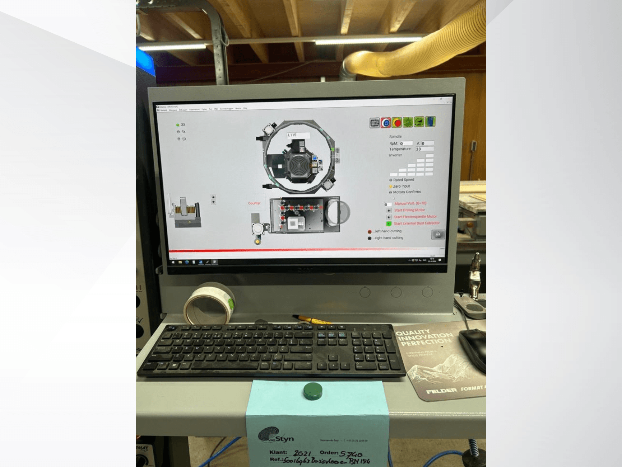Front view of the FORMAT4 FELDER FORMAT 4 H100 CNC machine control panel with a computer screen displaying operational details.
