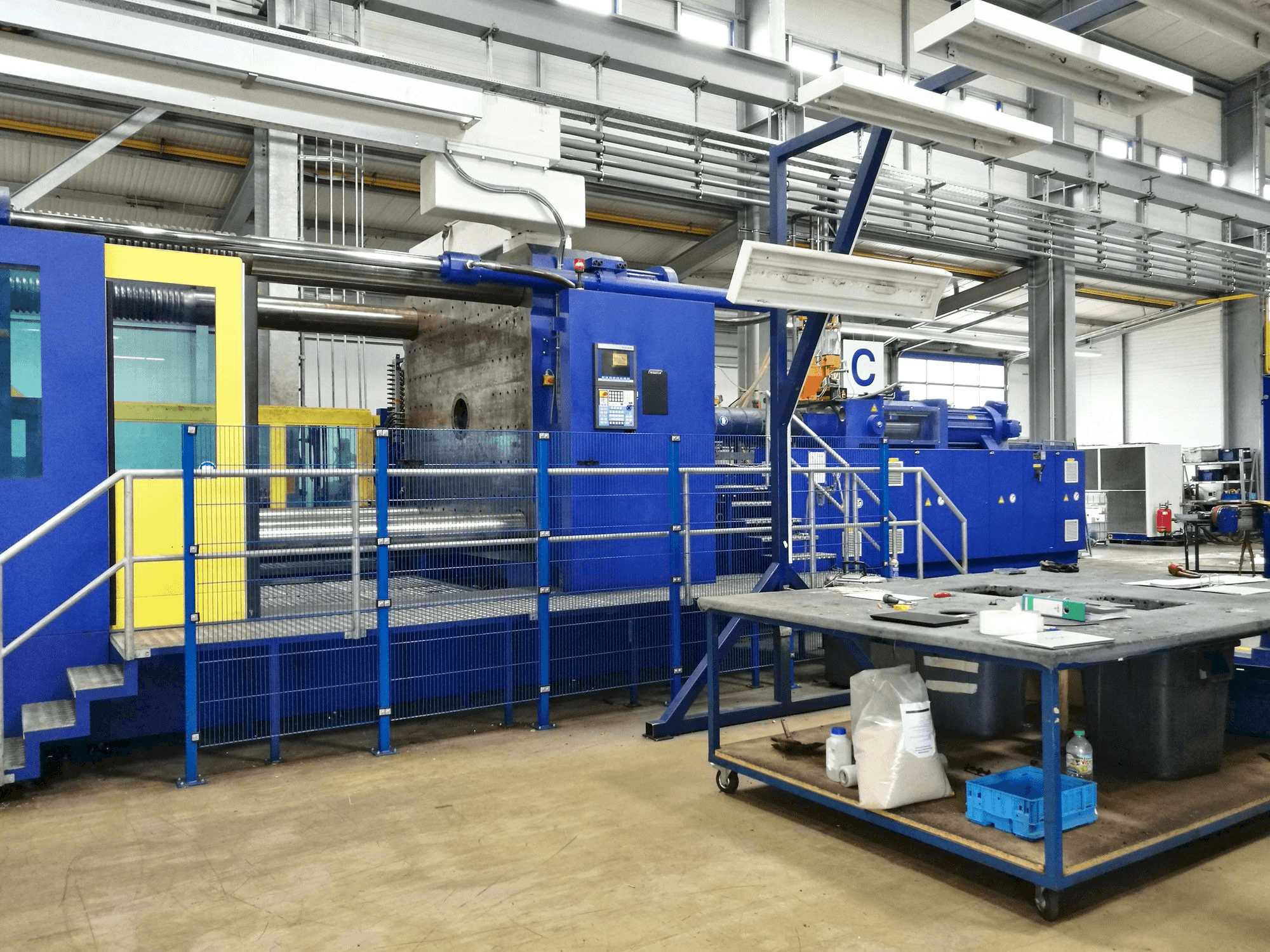 Front view of Krauss Maffei 2300-12000 MX machine