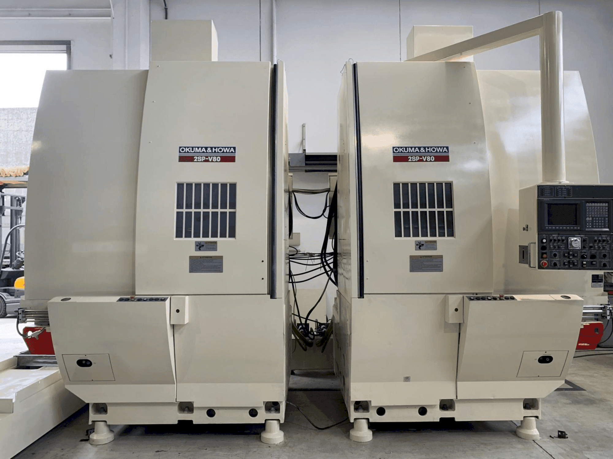 Front view of Okuma 2SP-V80 machine