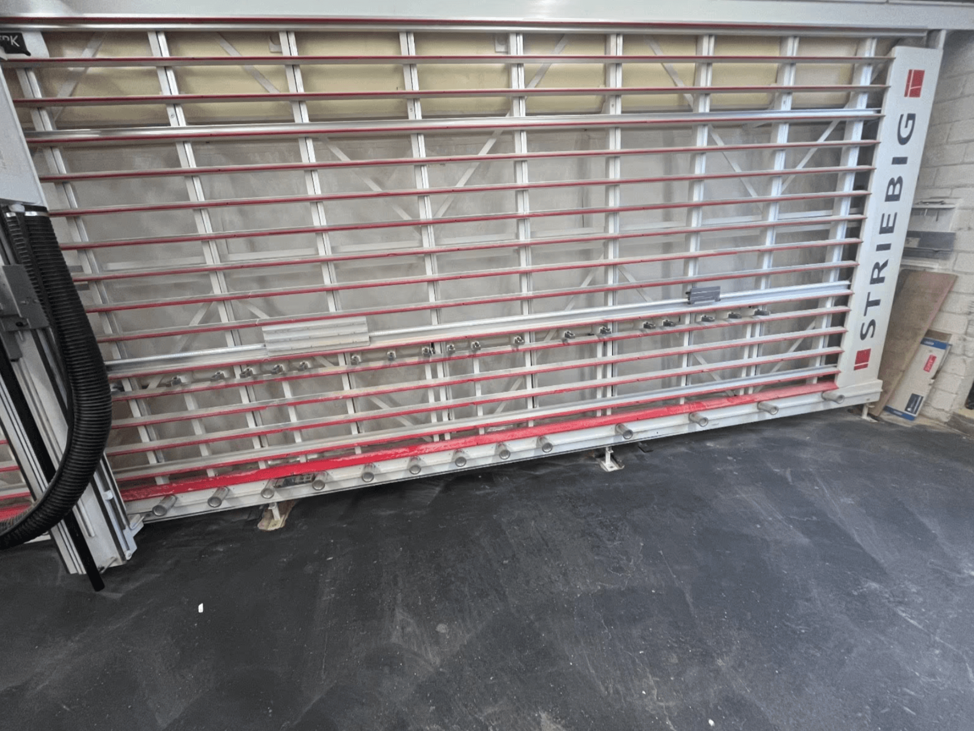 STRIEBIG Standart II TKR 6220A panel saw viewed from the front; features a metal frame with red rails and cutting components.