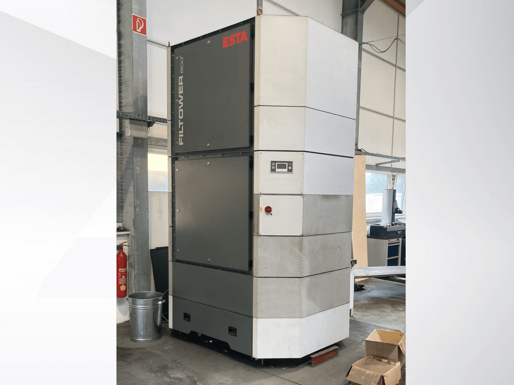 ESTA Filtower eco in gray and white, front view, features control panel and ventilation ports. Suitable for industrial air filtration.