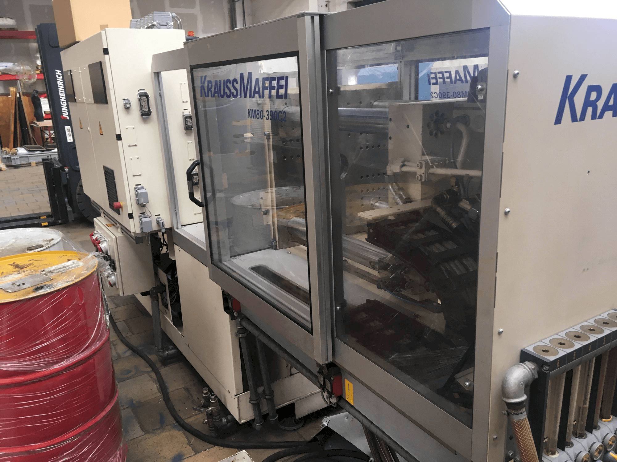 Right view of Krauss Maffei 80/390 C2 machine