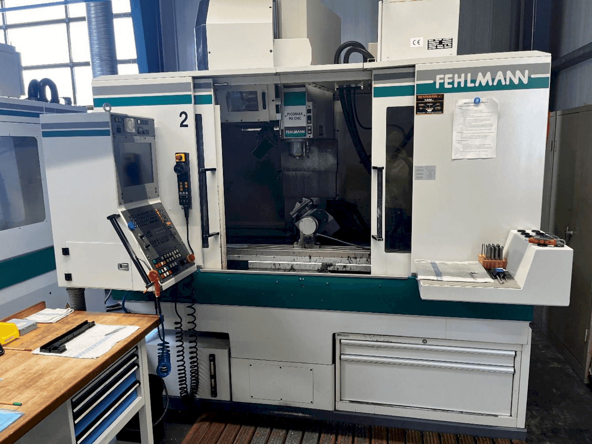 Front view of FEHLMANN Picomax 90 CNC machine