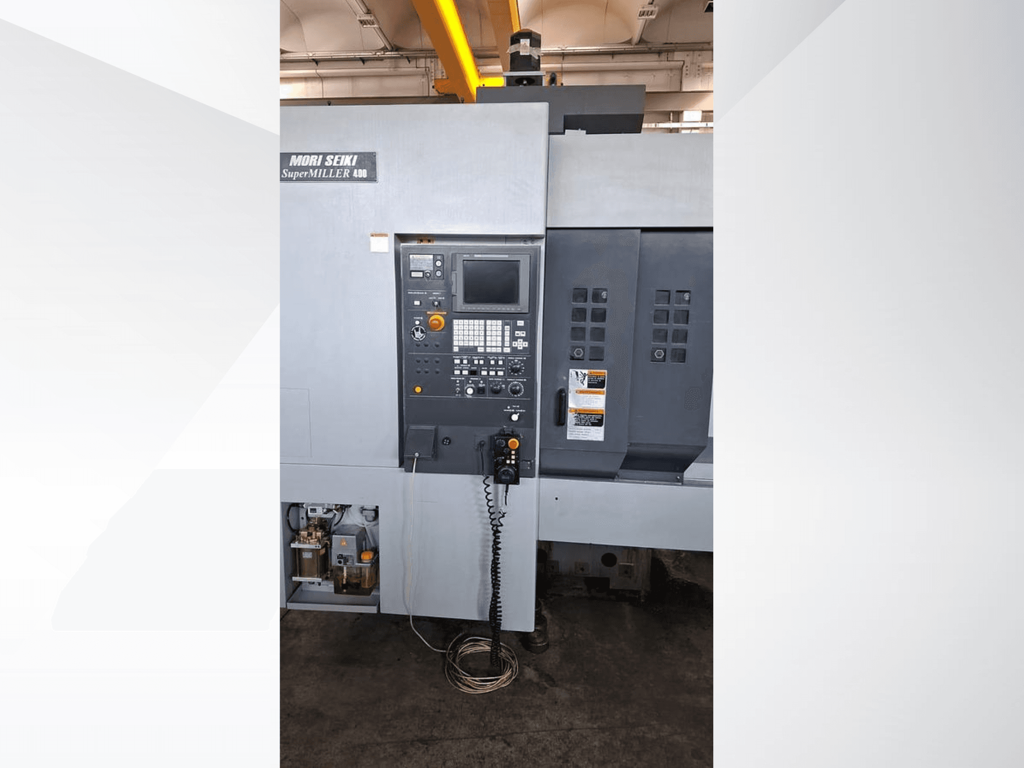 MORI SEIKI ZV 400 SUPER MILLER vertical machining centre, front view showing control panel and operational buttons.