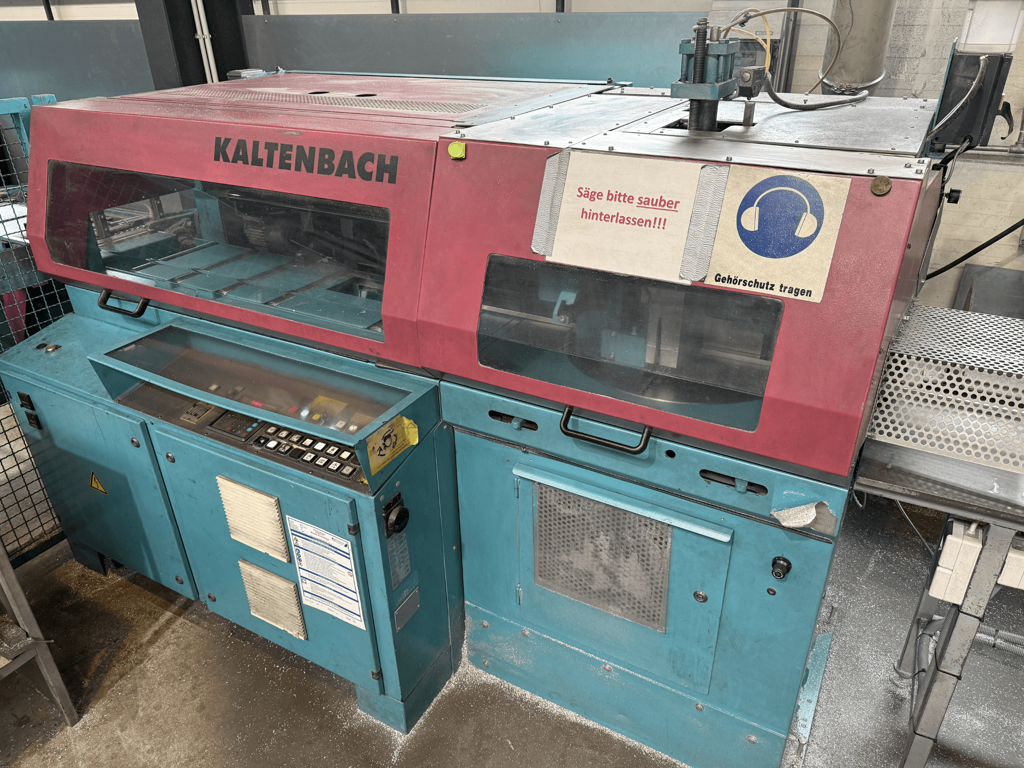 KALTENBACH industrial cutting machine, front view, featuring control panel and safety sign for hearing protection.