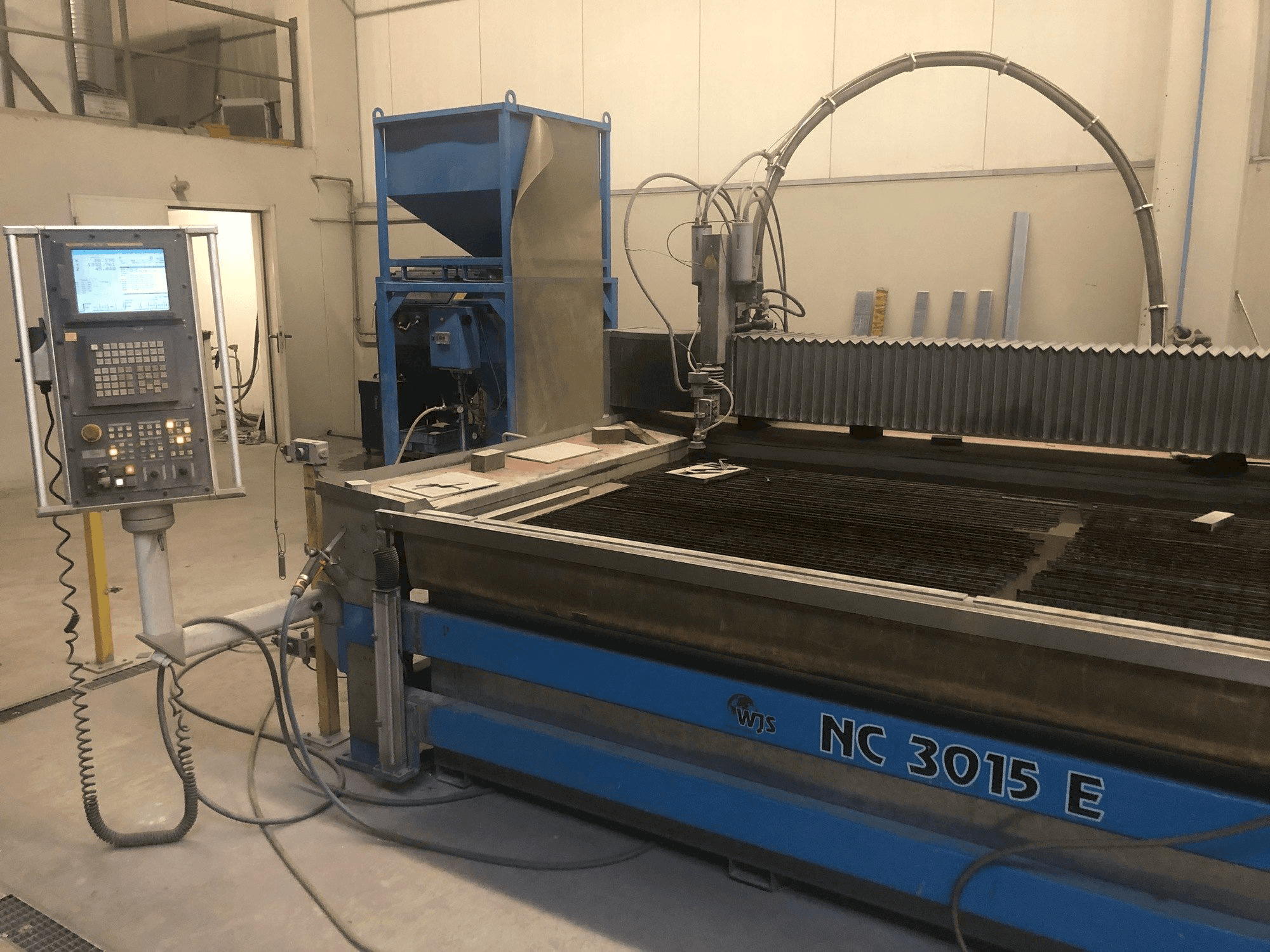 Front view of WJS NC 3015 E machine