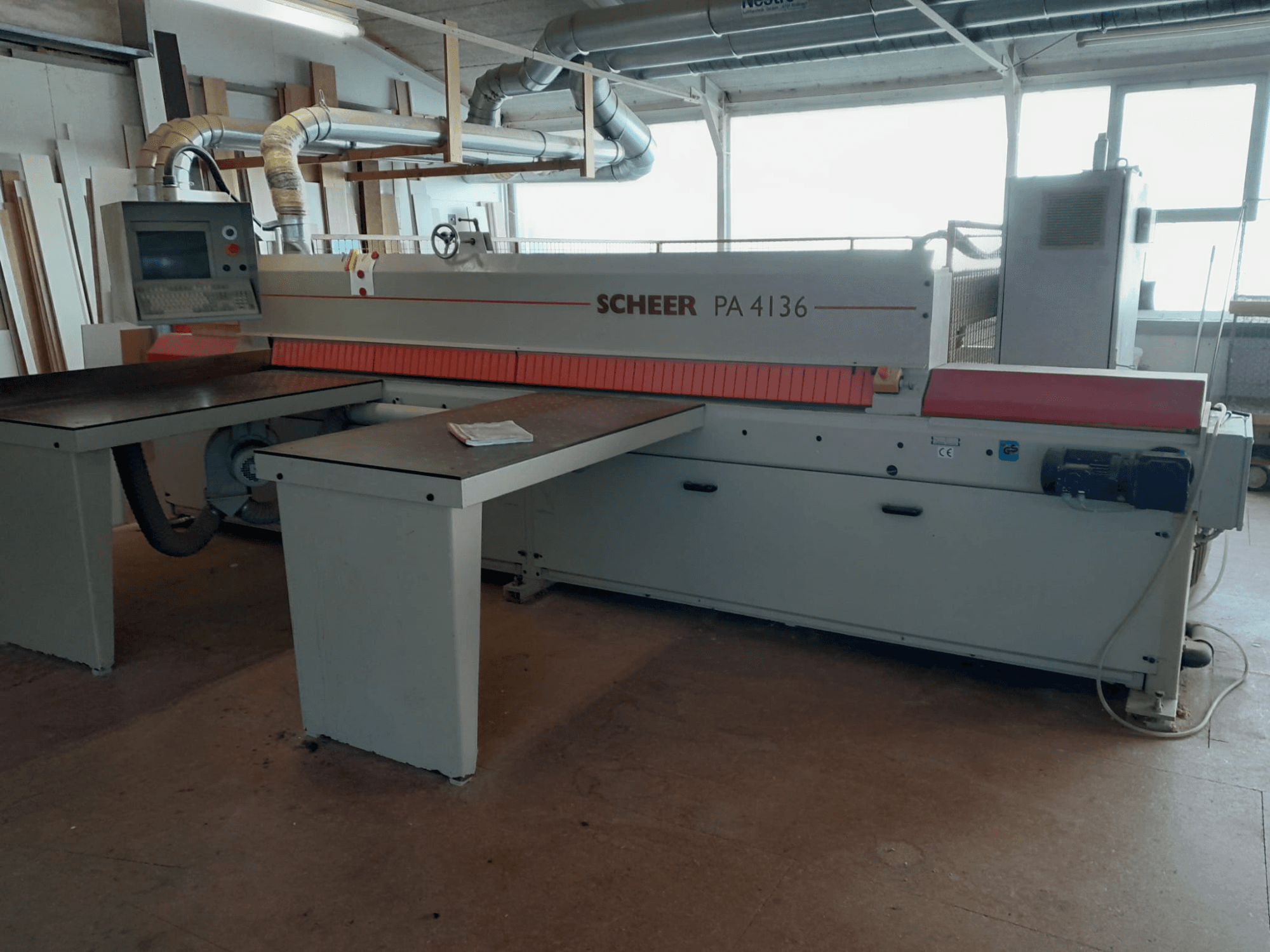 Scheer PA 4136 panel saw, front view, with a large cutting table, control panel, and industrial design in a workshop.