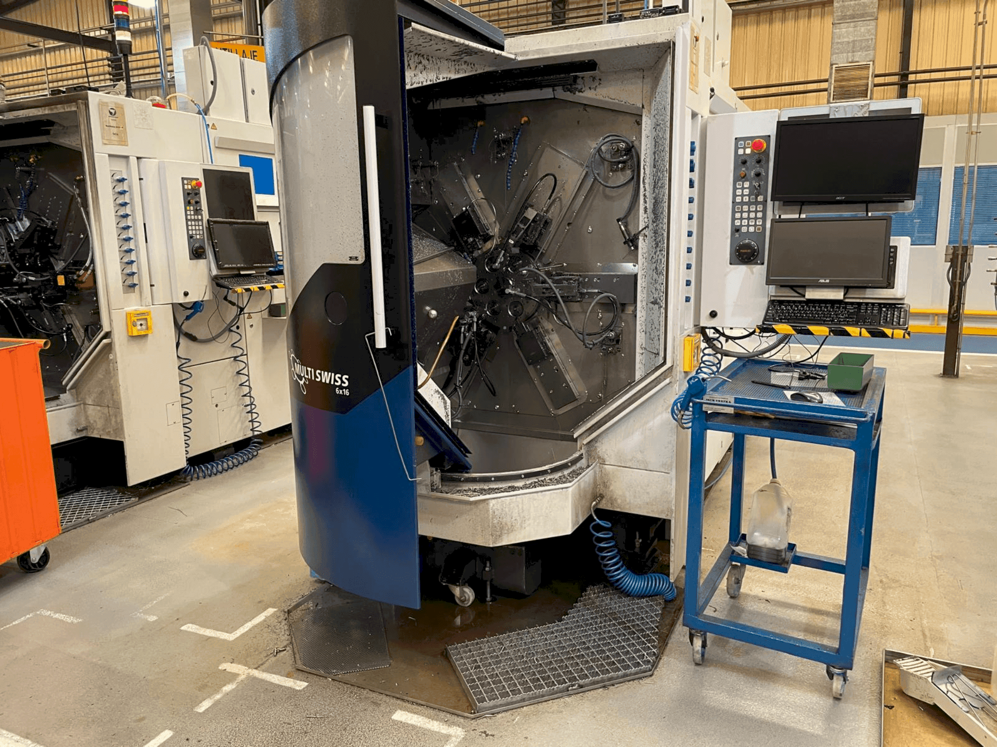 Front view of TORNOS MultiSwiss 6x16 machine